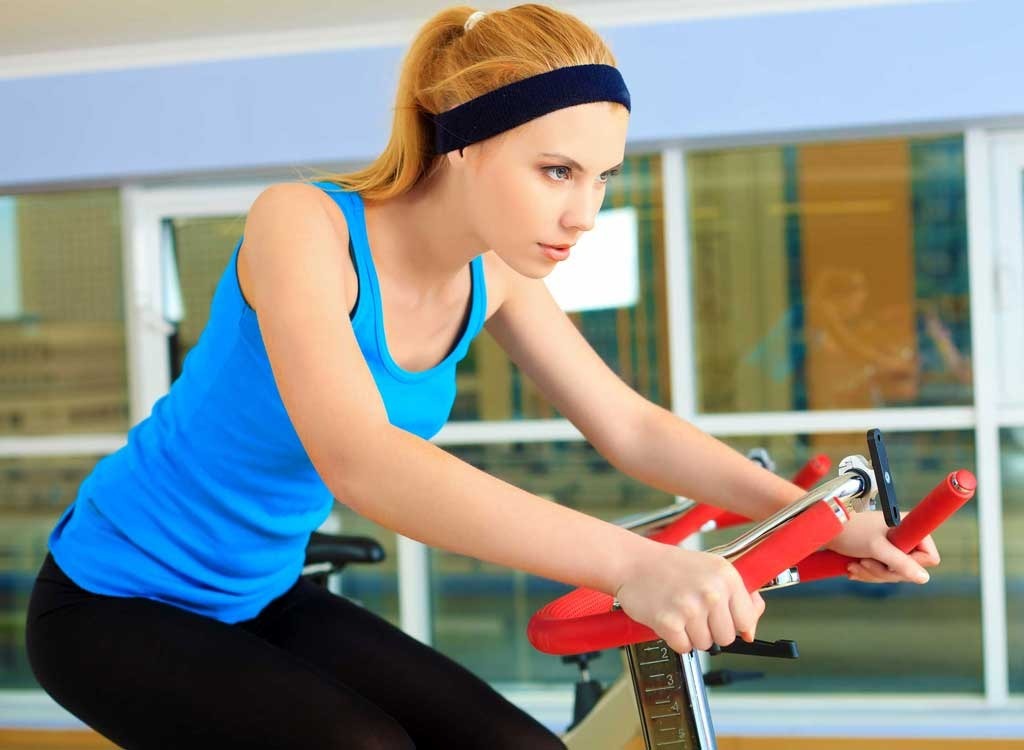 girl on gym bike