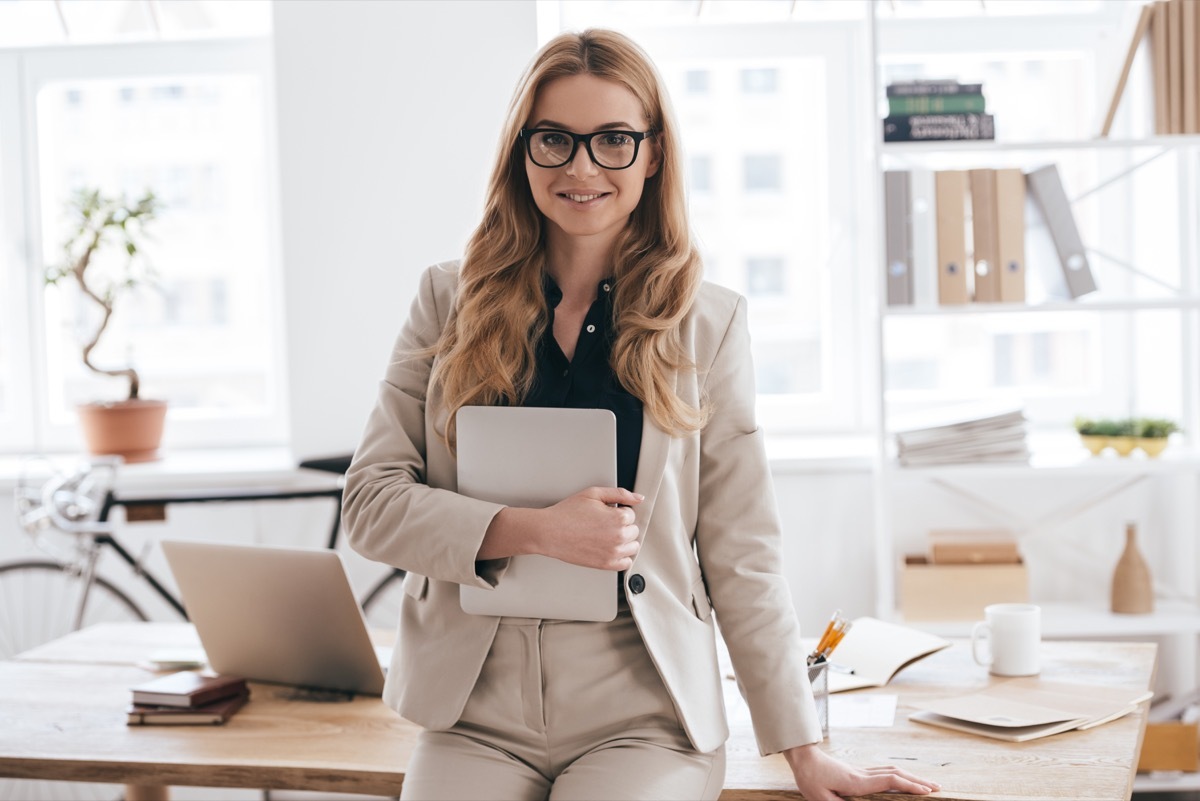 businesswoman holding tablet