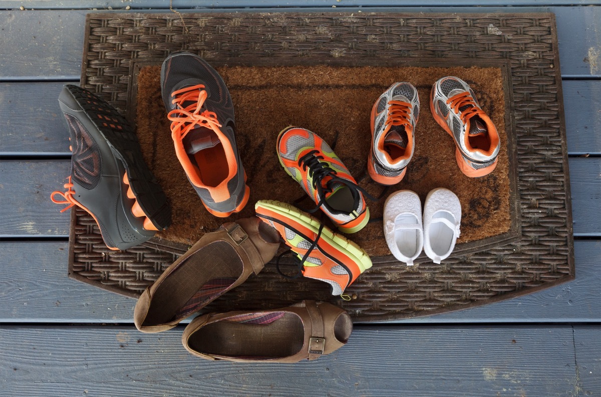 Pile of Shoes at the Door