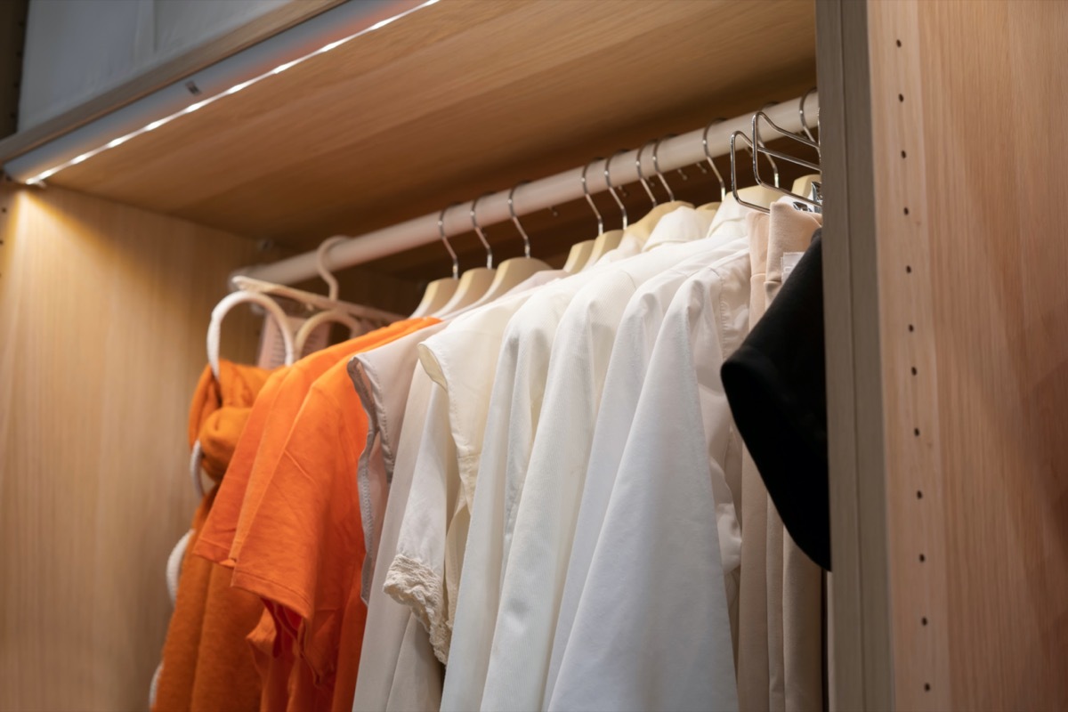 organized closet with led strip lighting