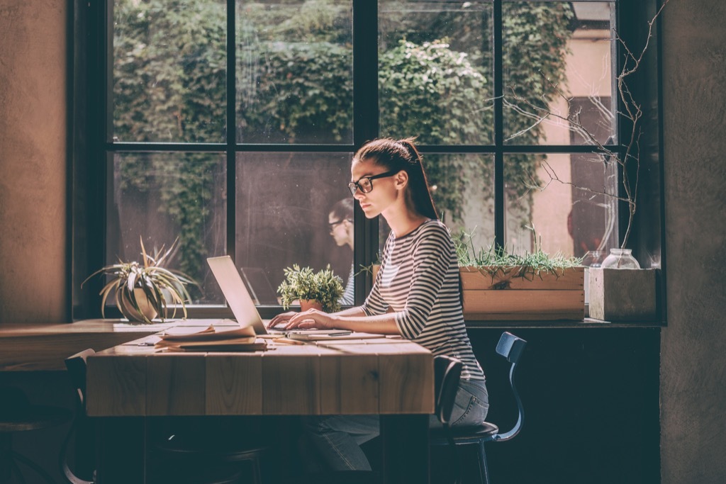 woman on laptop writing an email