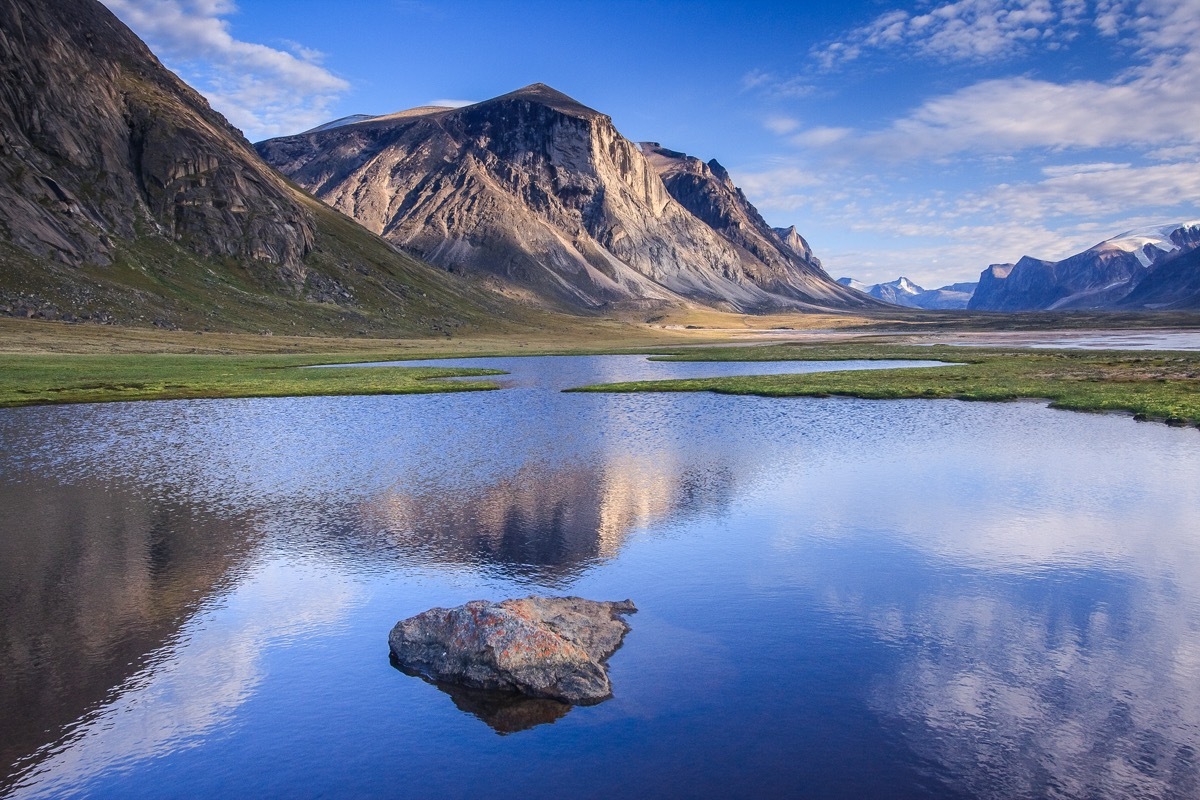 Pond reflections in Akshayuk Pass, Baffin Island, Nunavut