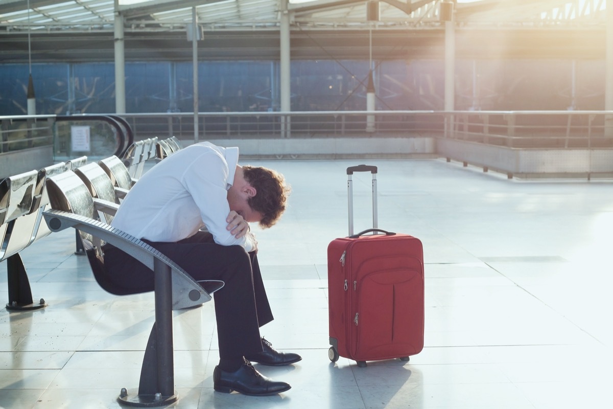 man tired from early morning flight