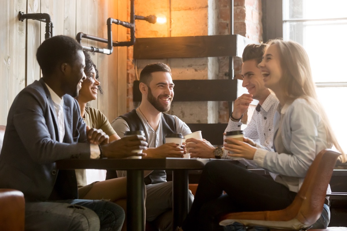 Group of friends talking at a cafe