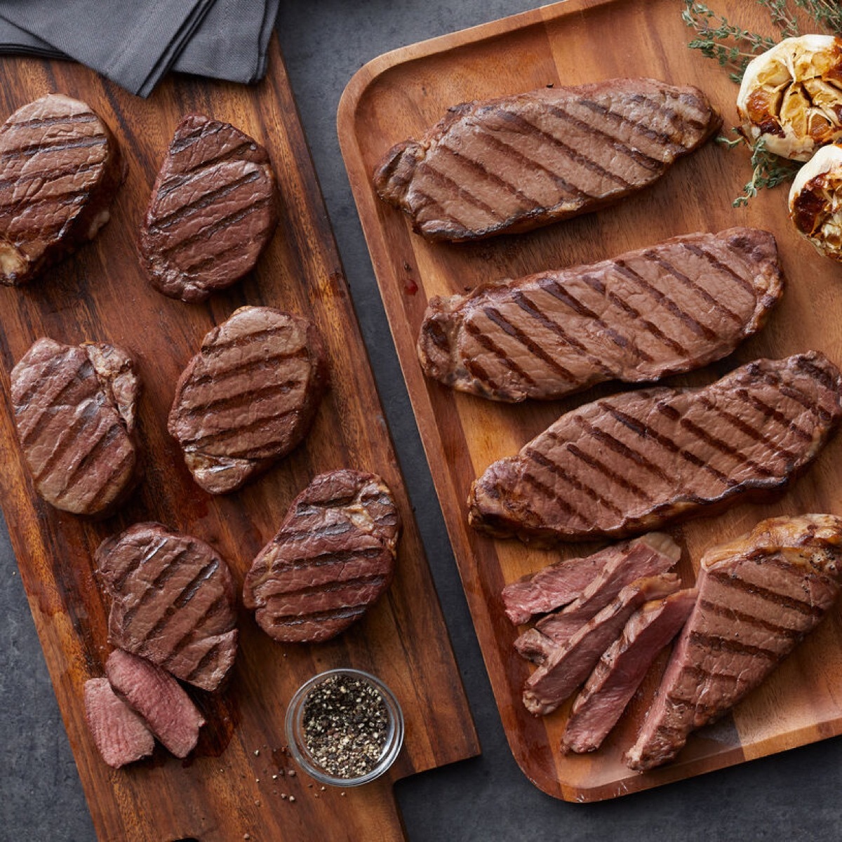 gourmet steaks on cutting boards