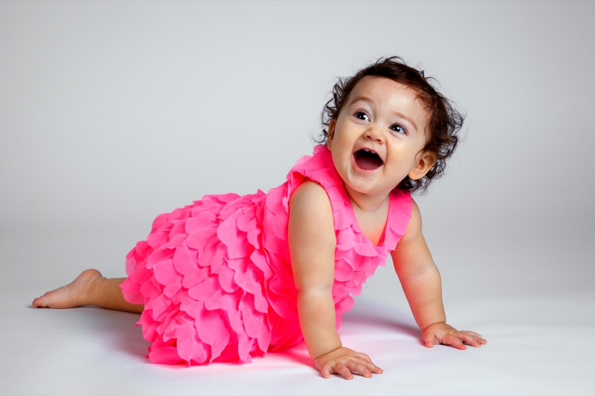 baby girl in pink dress