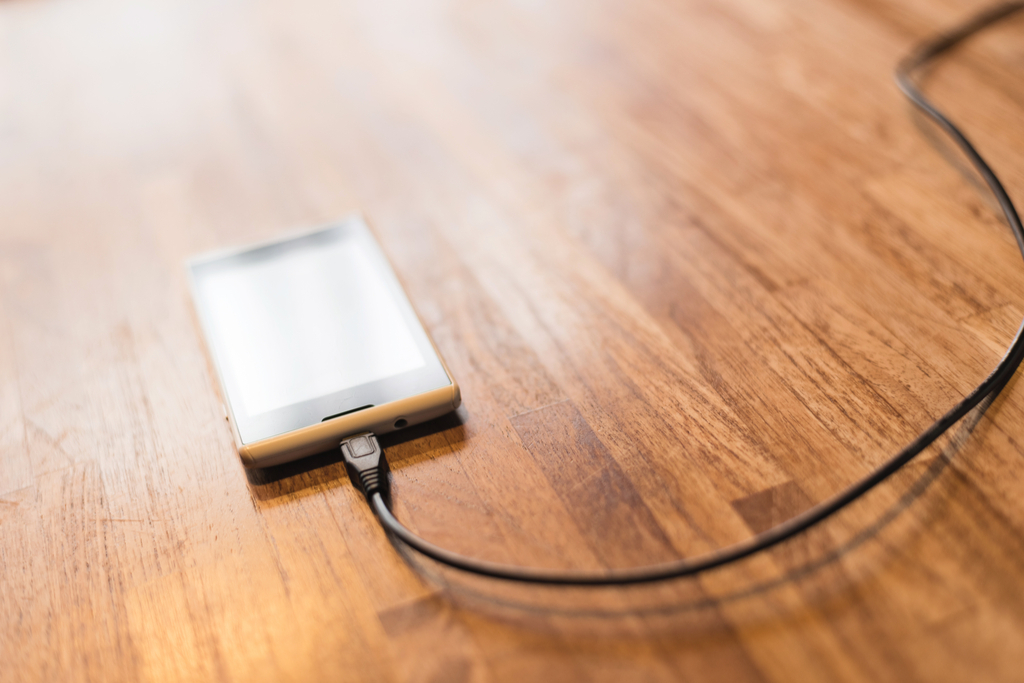 Charging Smartphone on Table 