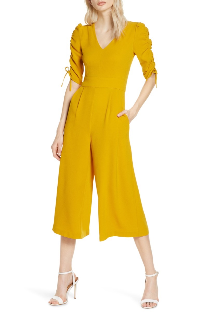 woman in yellow jumpsuit