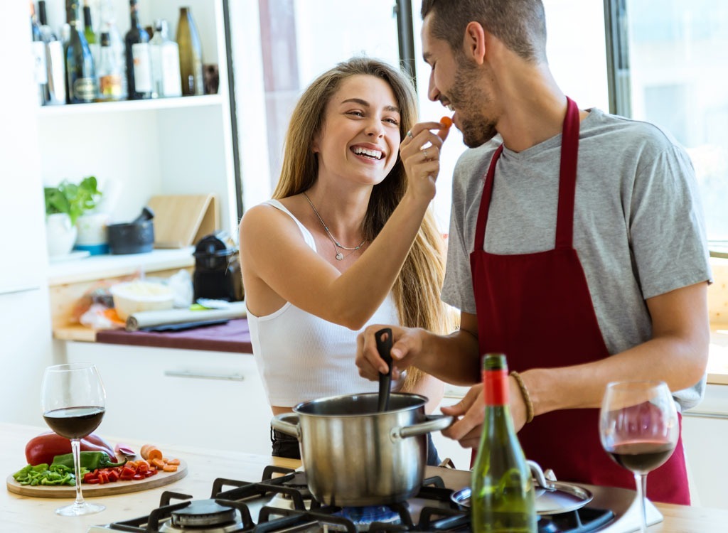 Young couple cooking