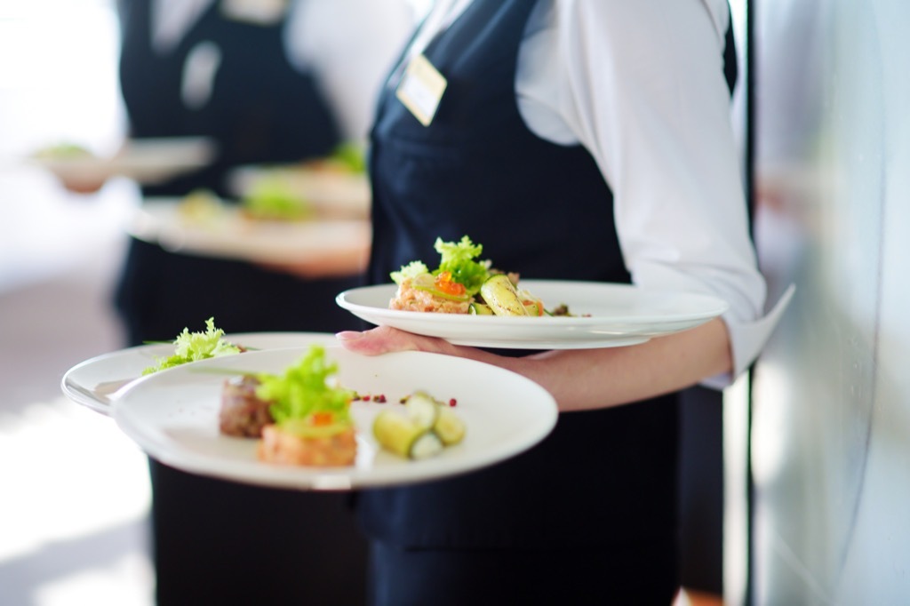 waitress holding plates