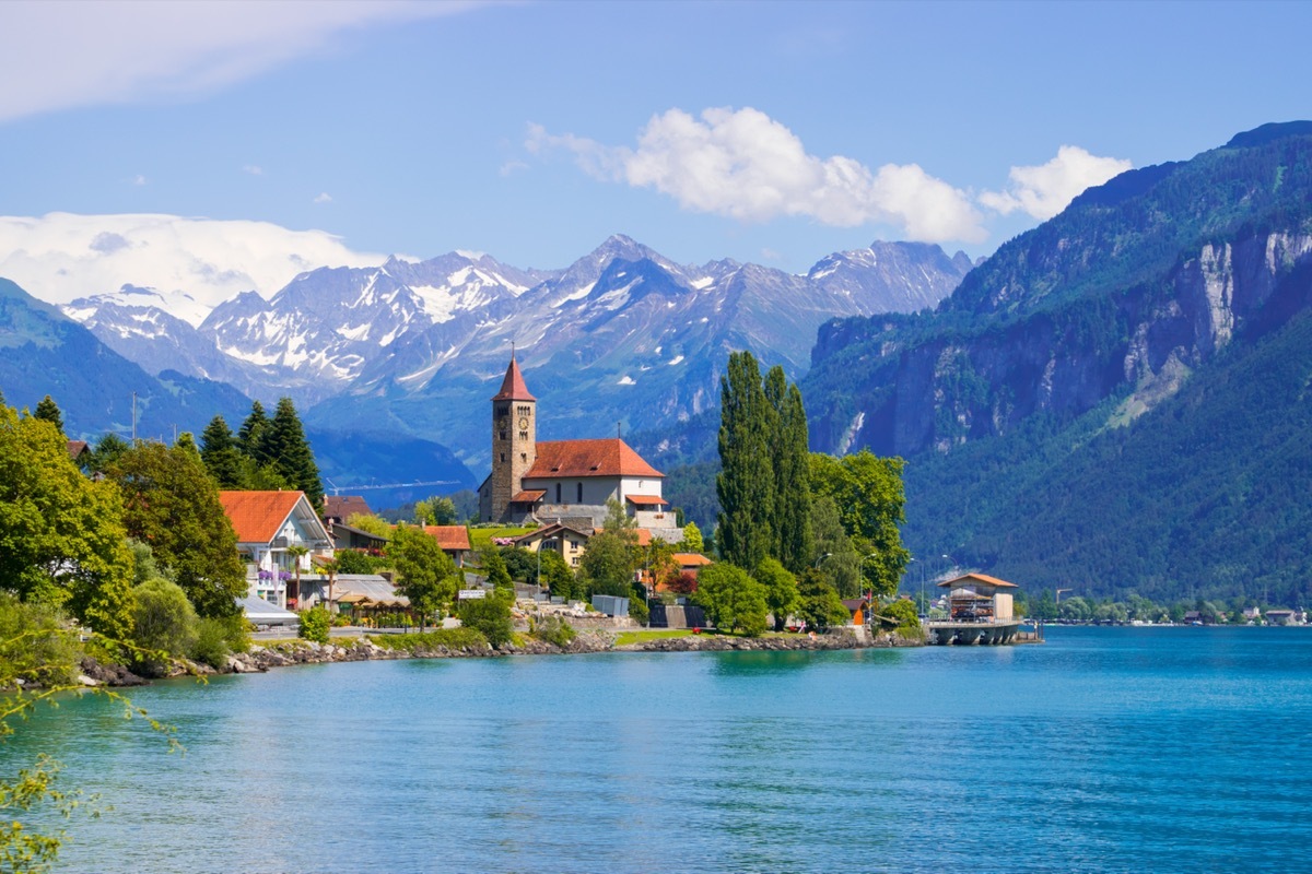 Swiss alps in the background of a small town in Switzerland.