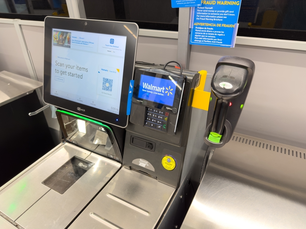 A close up of a Walmart self checkout counter