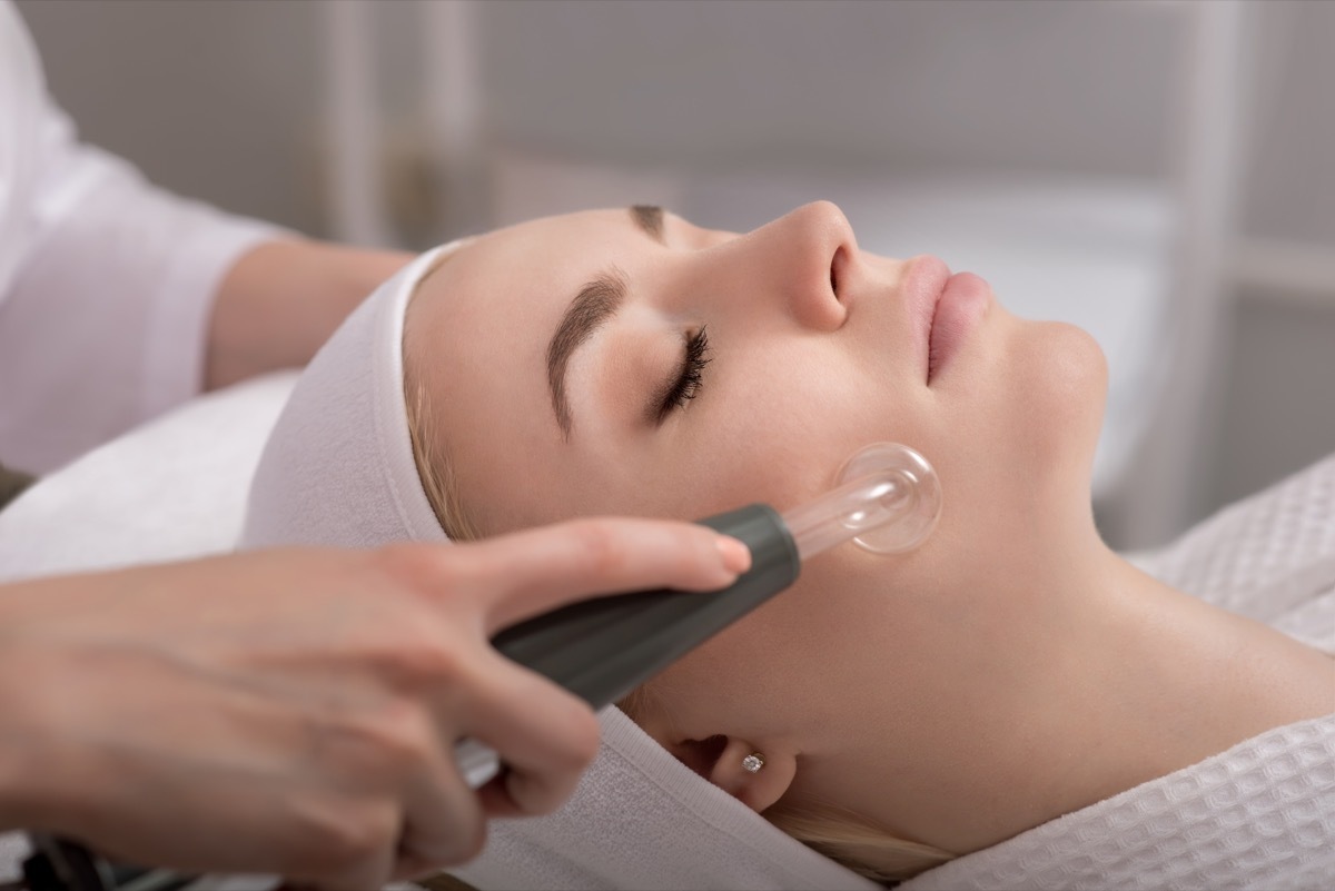 woman receiving a vacuum facial