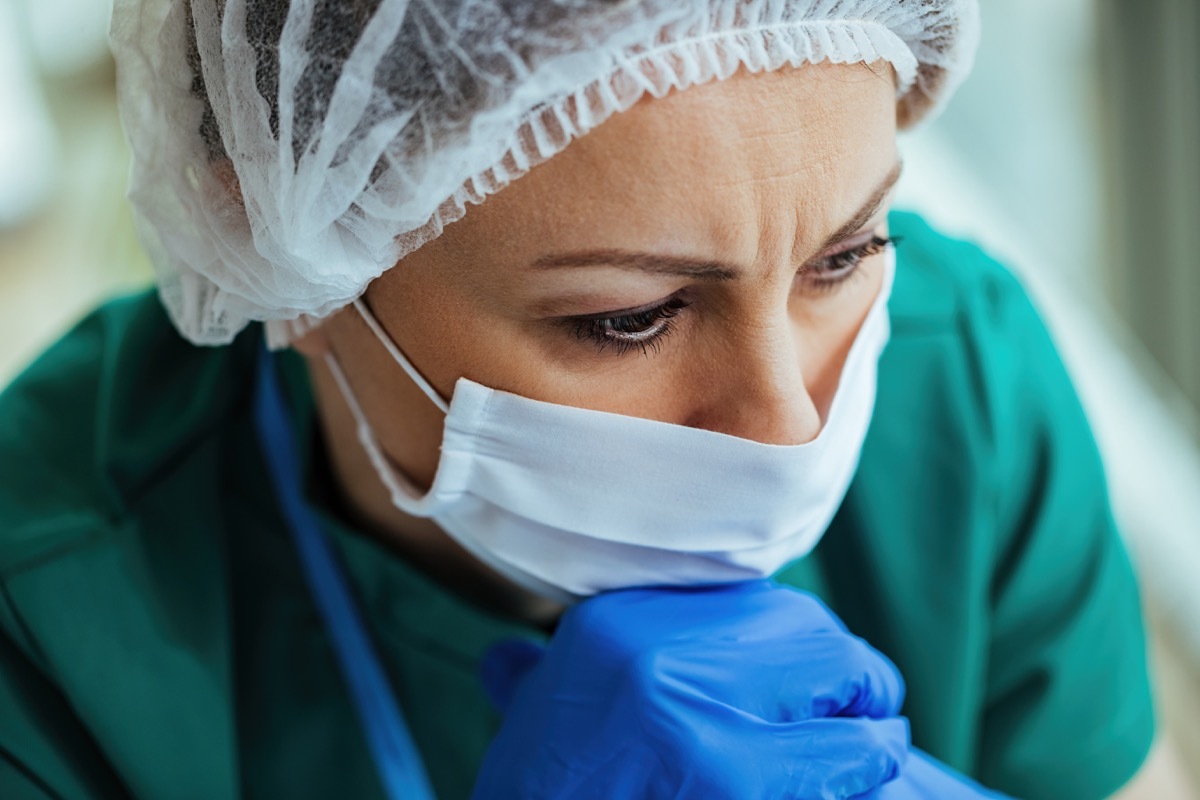 Close-up of worried healthcare worker thinking at the hospital.