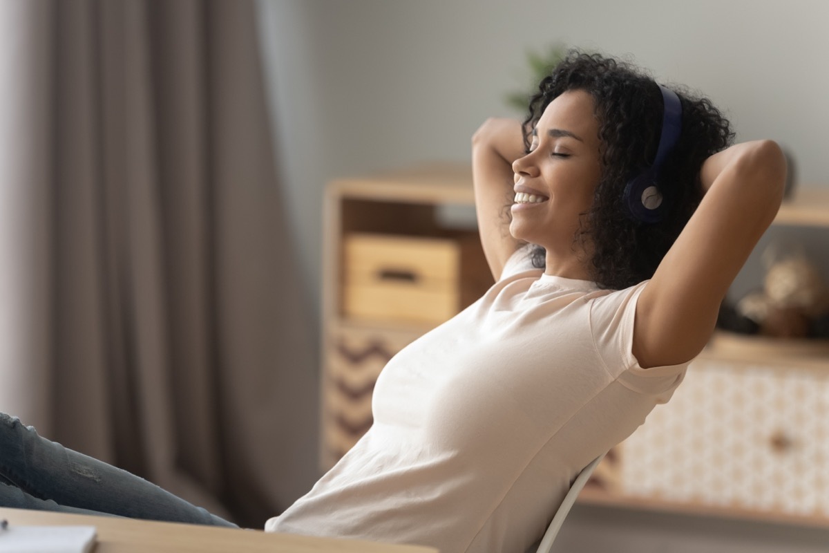 Young Black Woman Relaxing on Couch