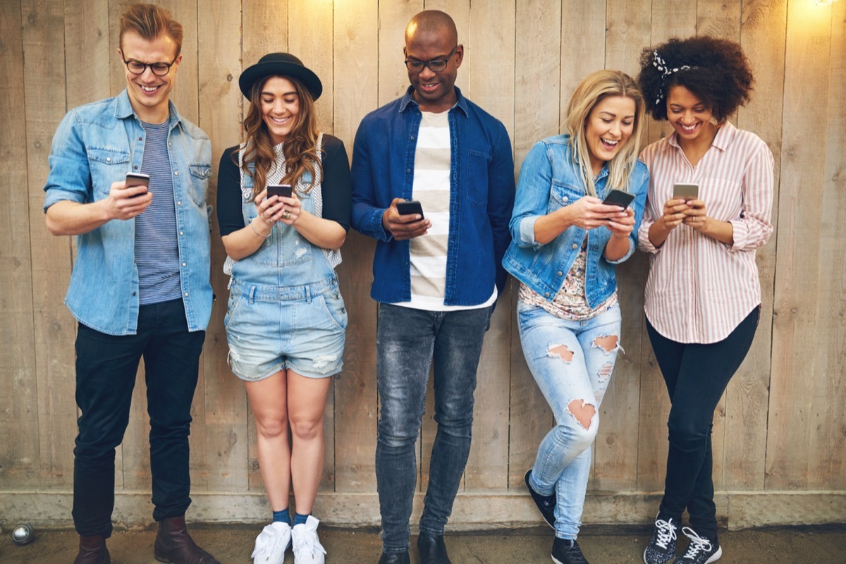 Group of People Hanging Out and Texting