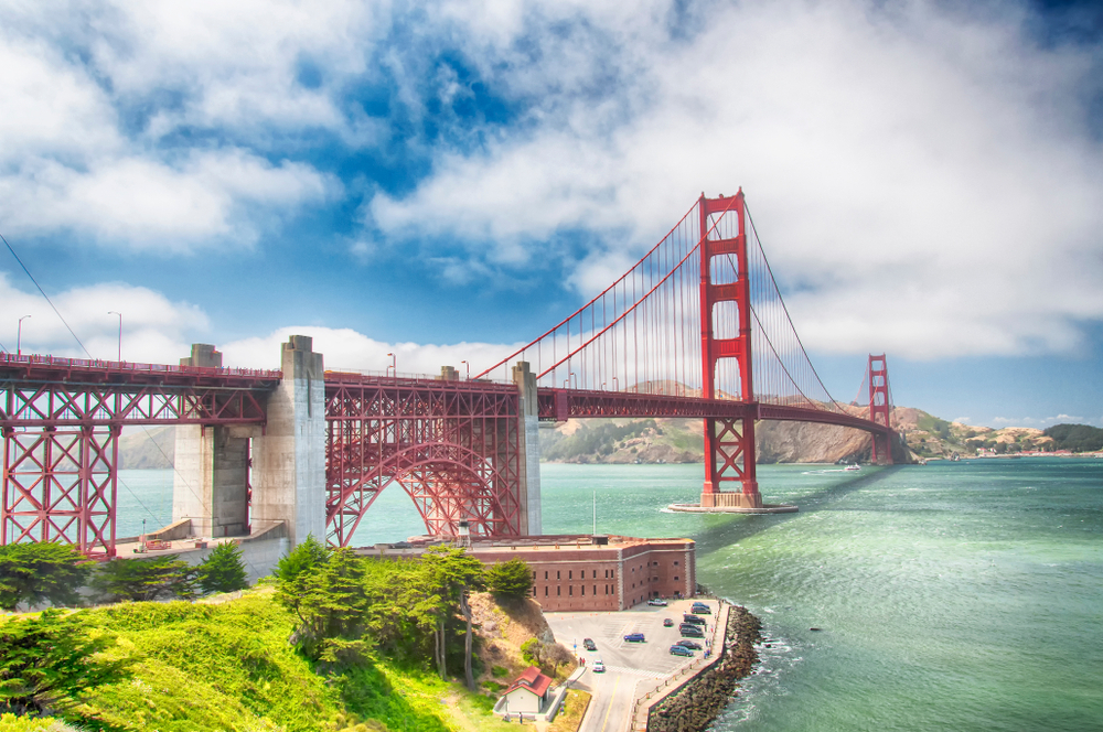 An aerial view of Fort Point National Historical Park with the Golden Gate Bridge in the background