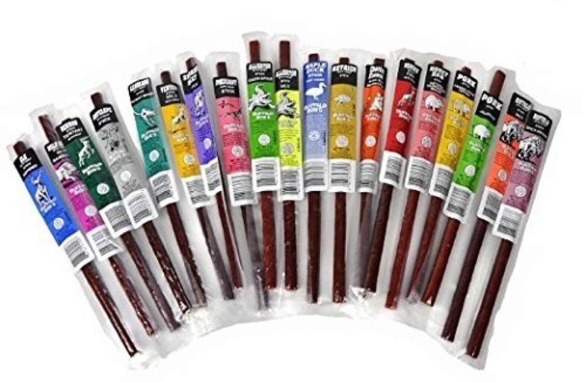 multiple meat sticks on white background