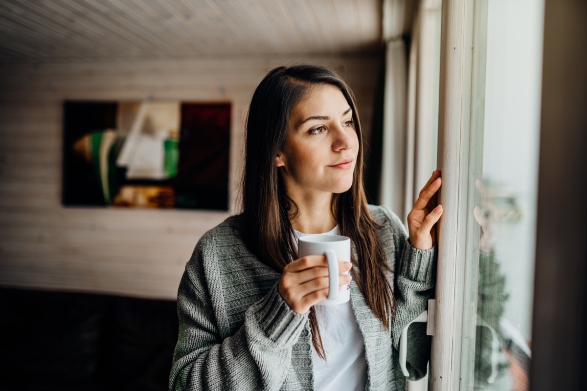 Young woman spending free time home