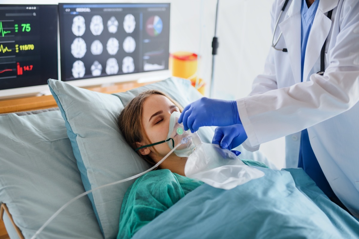 Infected patient in quarantine lying in bed in hospital