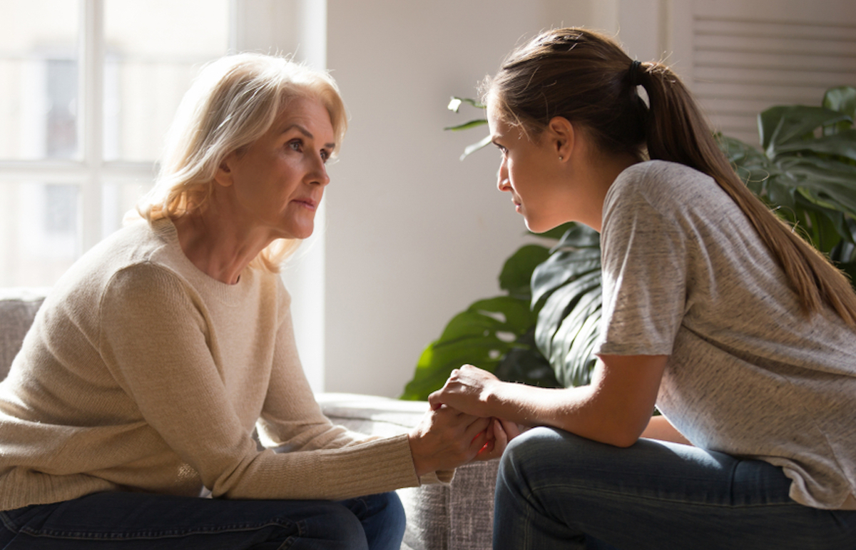 mother and adult daughter talking