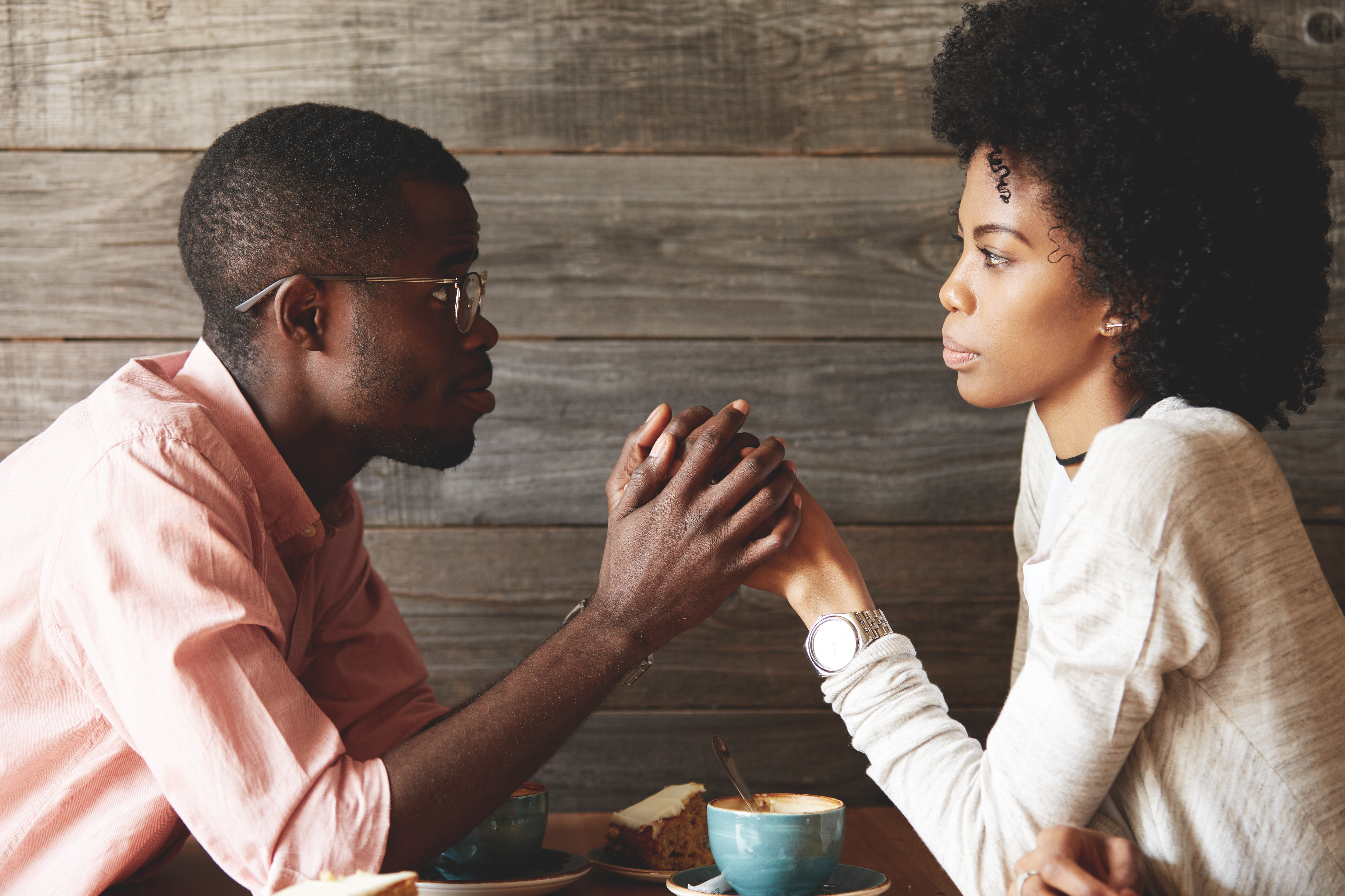 man and woman contemplating things at coffee, what he wants you to say