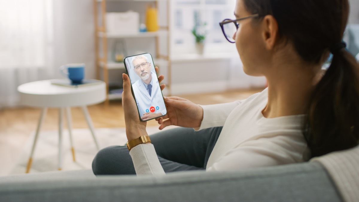 girl calling doctor using video conference