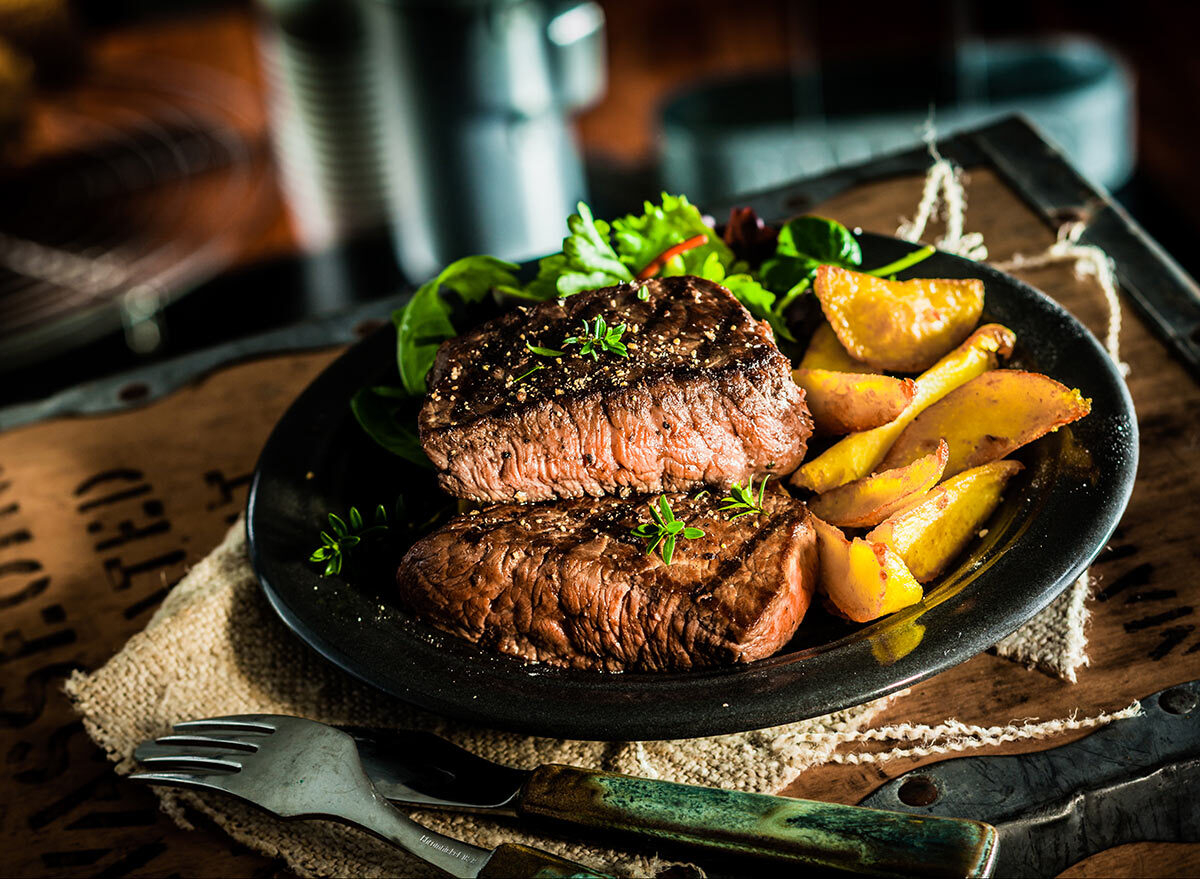 steak and potatoes on a plate