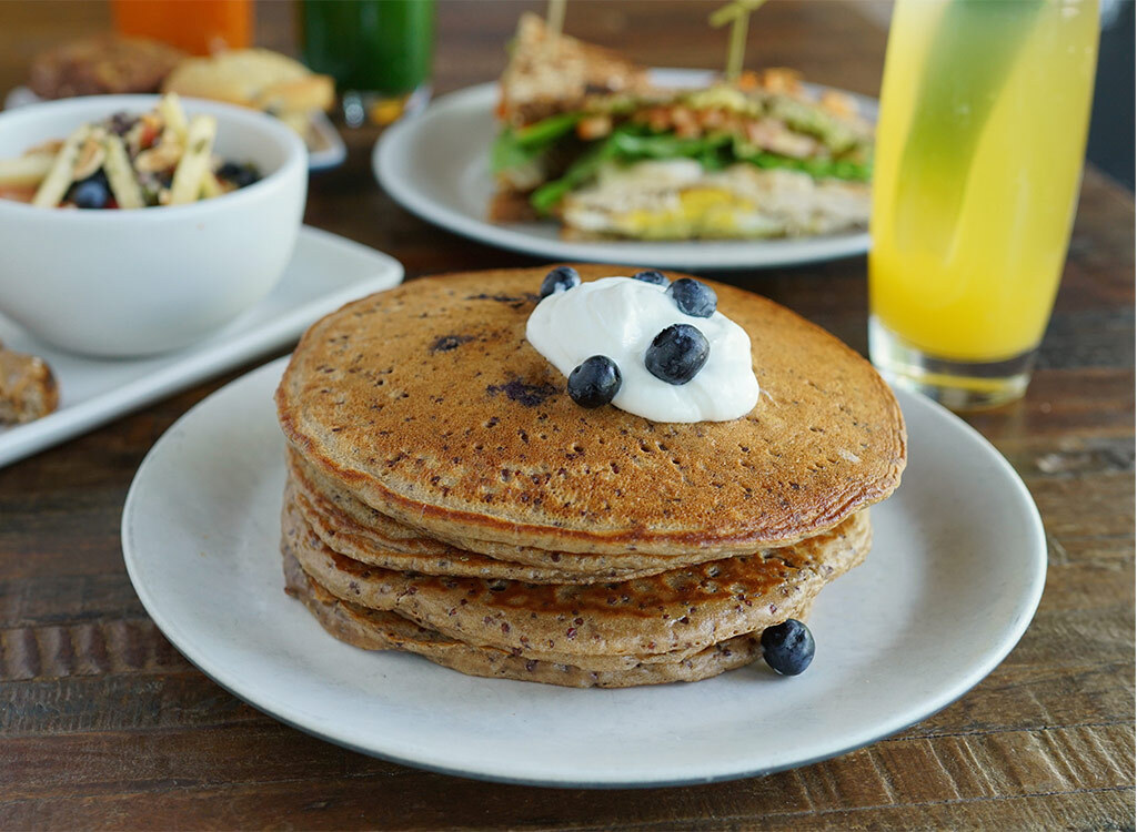 True food kitchen blueberry pancakes with cream on top