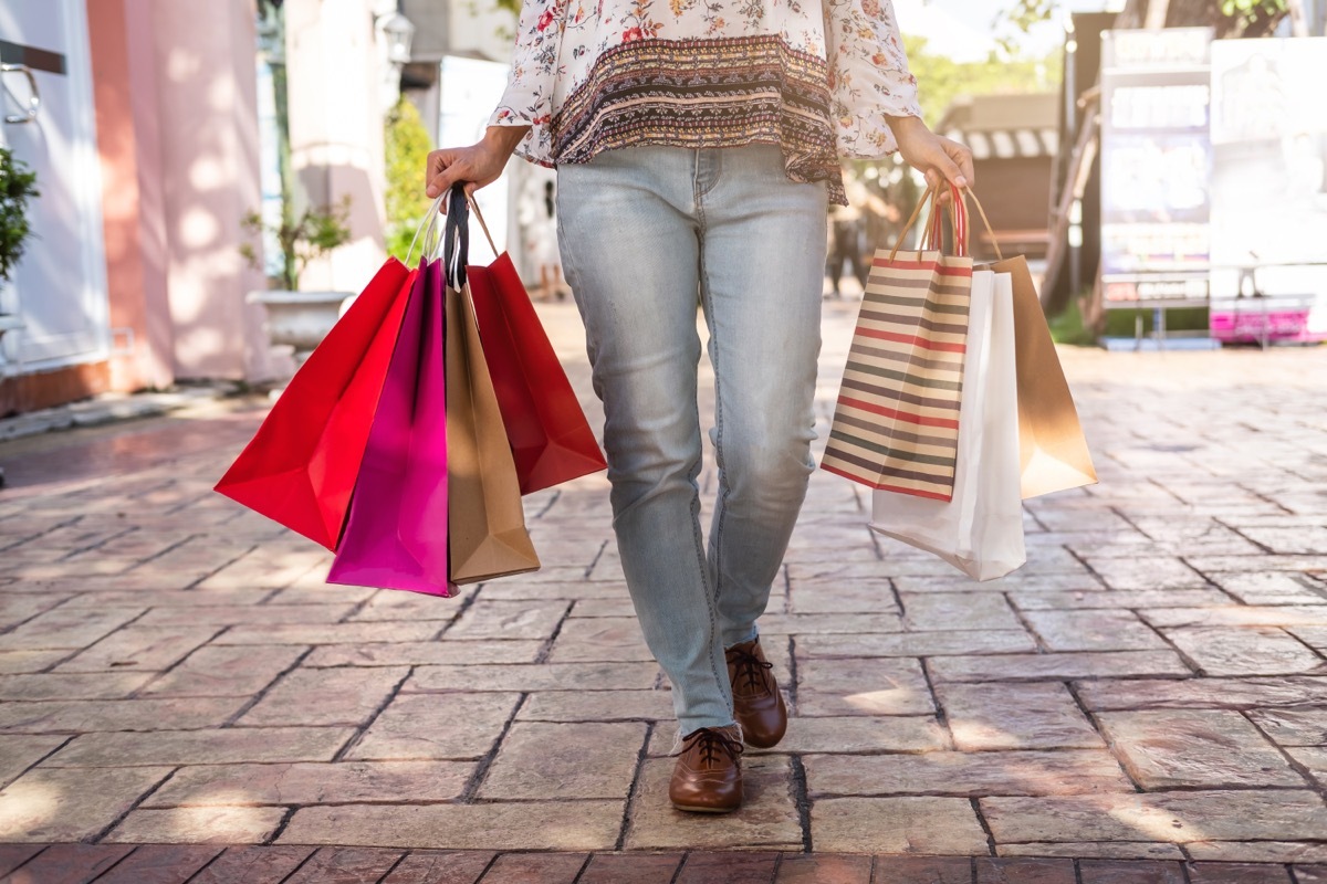 woman carrying shopping bags