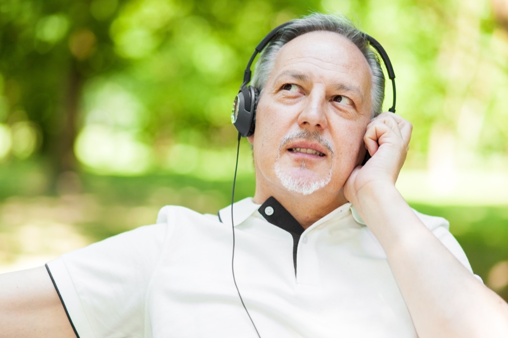 old man listening to music