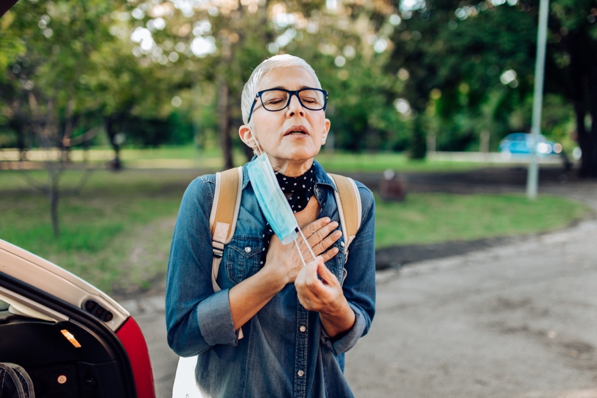 Senior woman having breathing difficulties