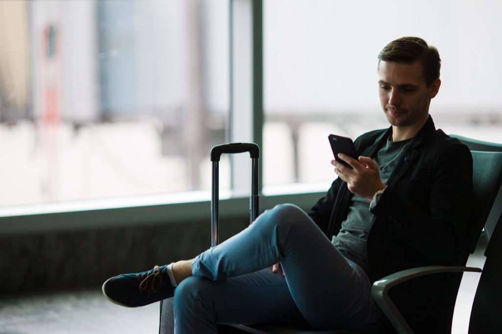 man waiting in airport punctual