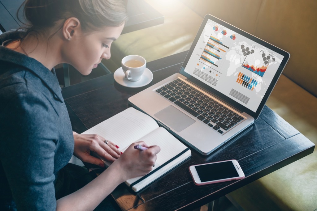 stressed out woman working at laptop