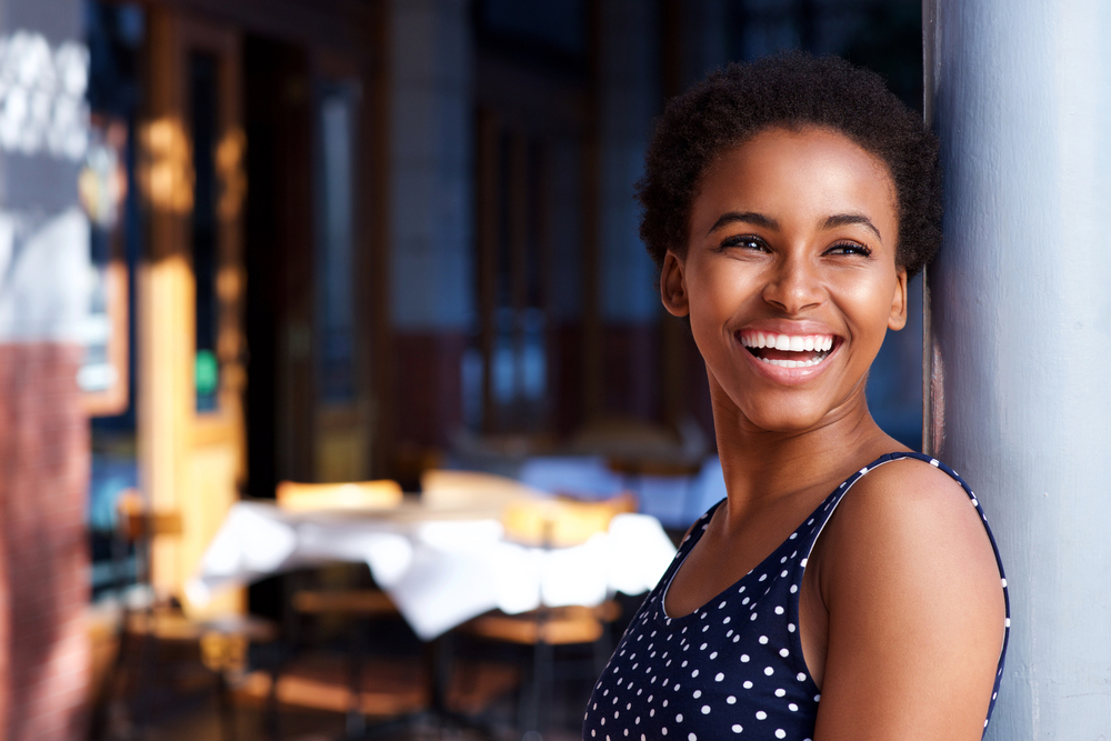 confident woman with her arms crossed