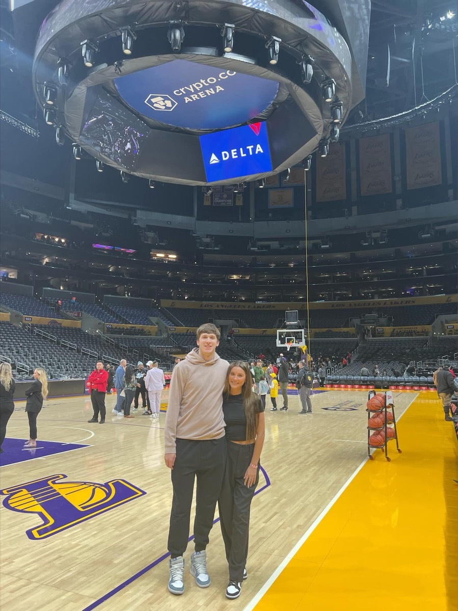 Austin Reaves and Jenna Barber at a Lakers game in 2023