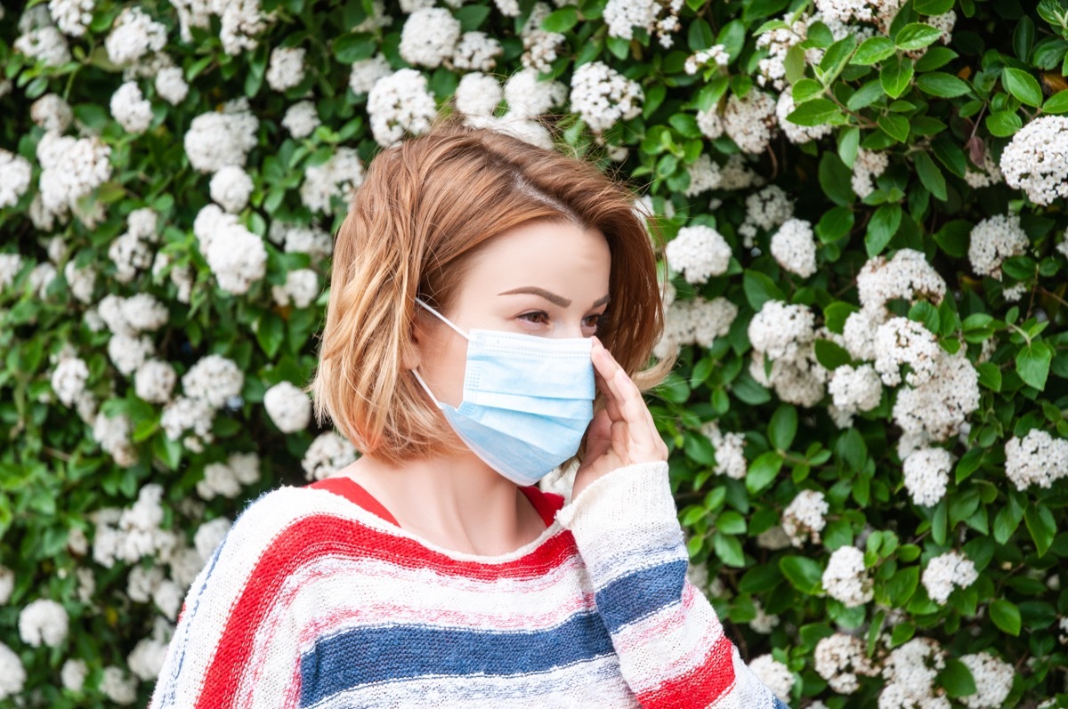 young white woman wearing a face mask