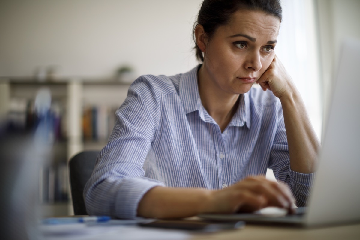 Woman struggling with new technology