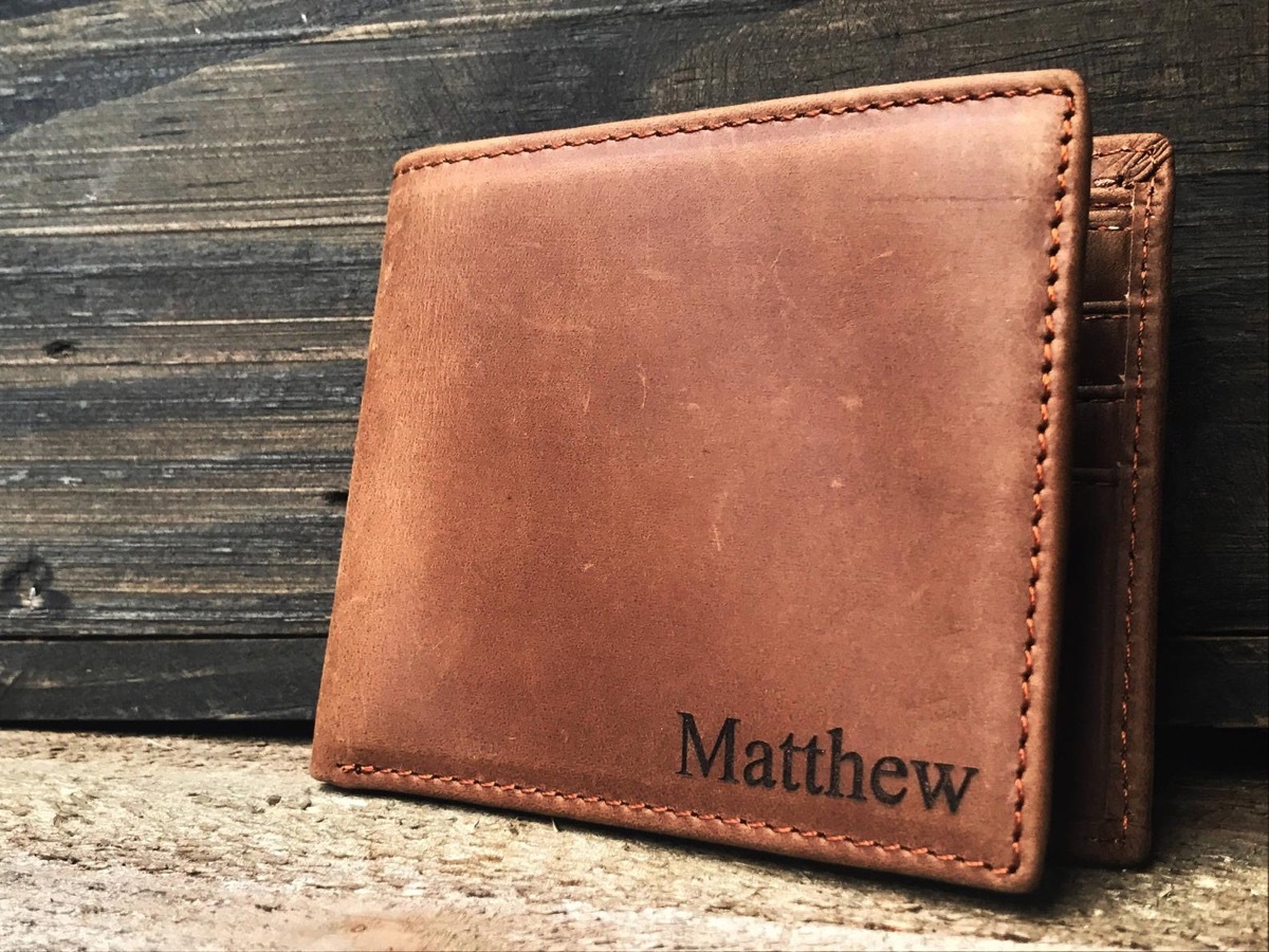 brown leather wallet with name Matthew on it