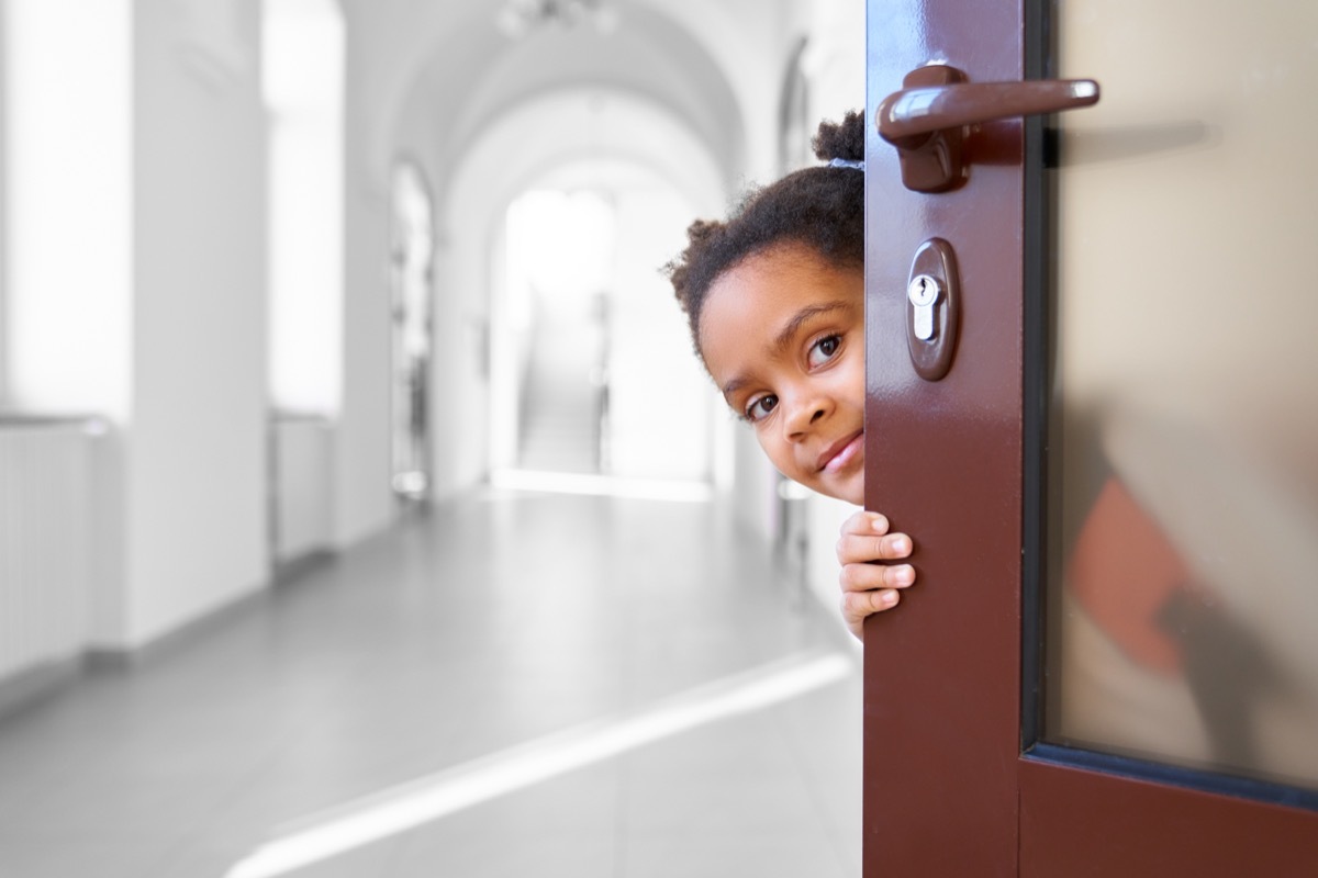 girl holding door open old-fashioned manners