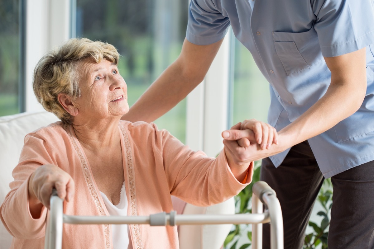 Elderly woman with walker