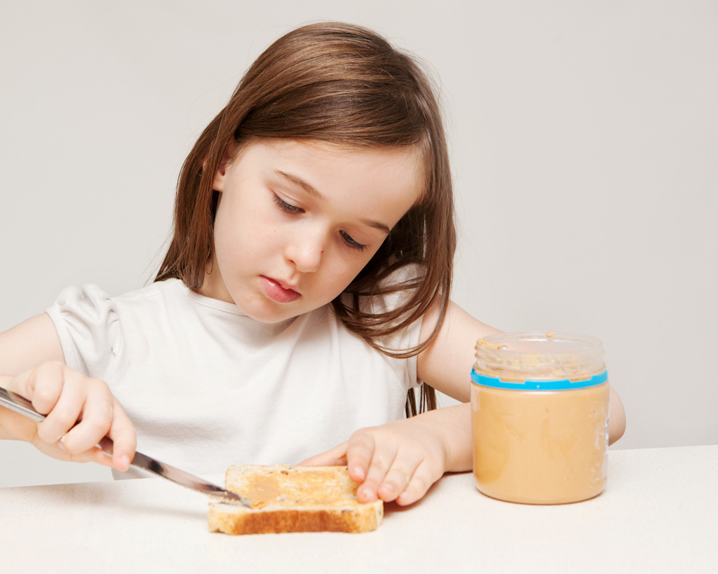 girl making peanut butter sandwich, parenting is harder