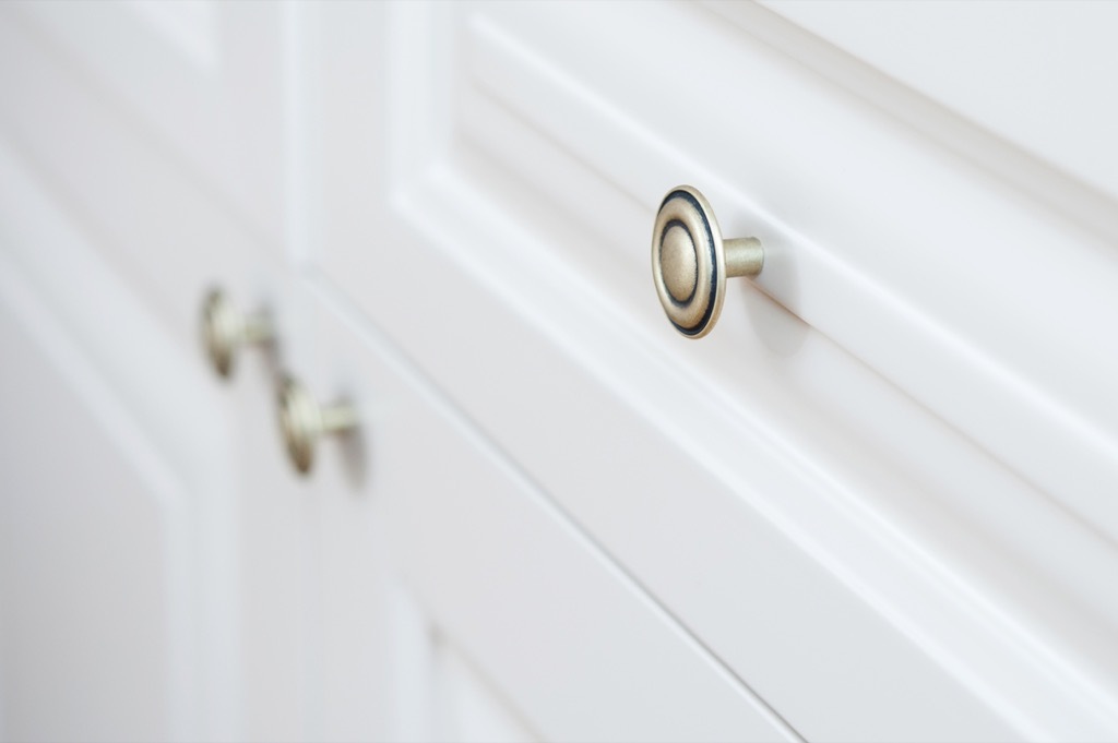 drawer pulls on white cabinets, signs your home is falling apart