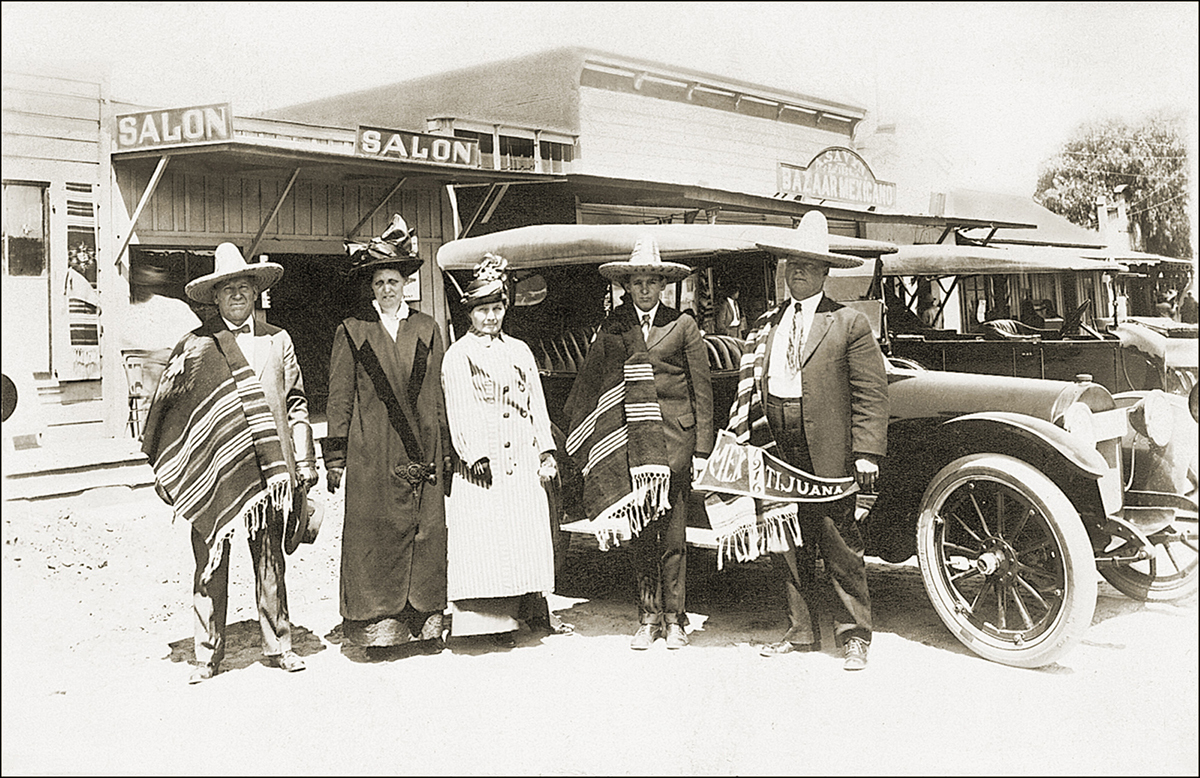 two women and three men pose for a photo in mexico