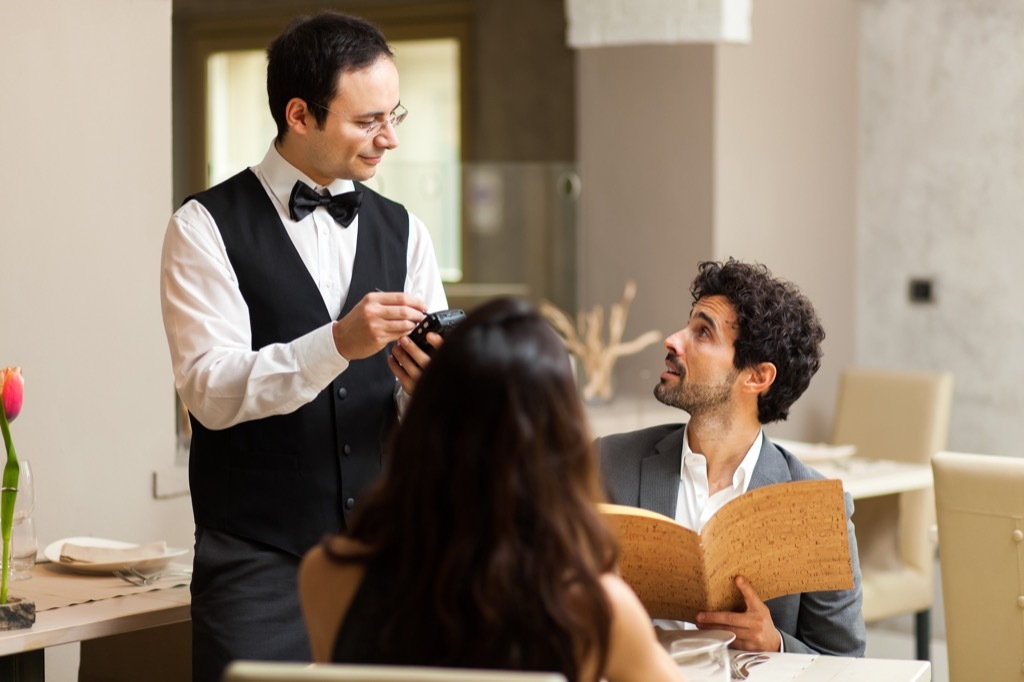 couple ordering food at a restaurant