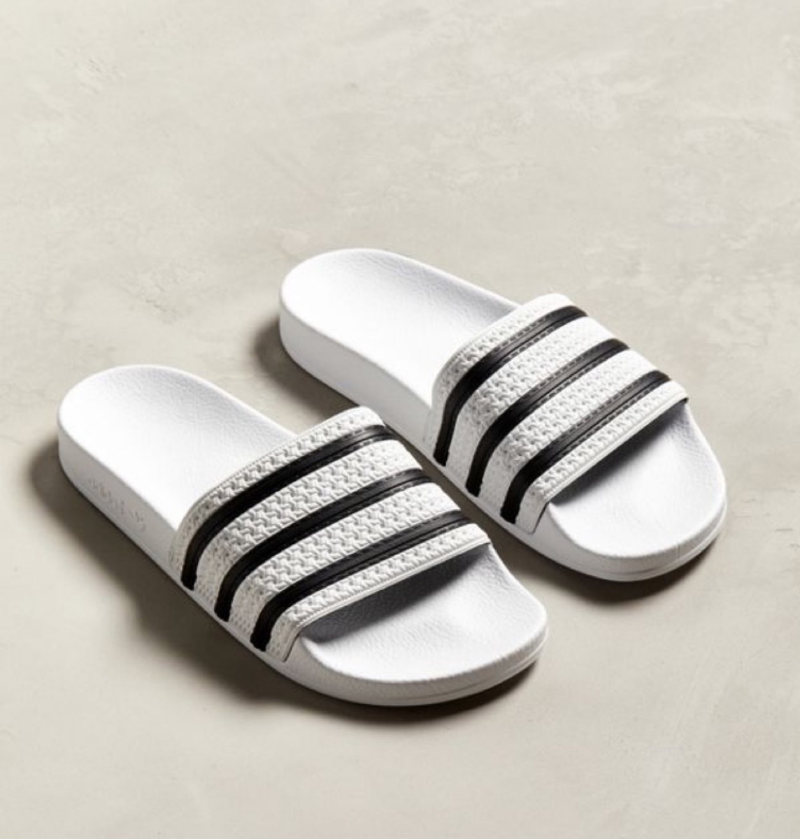 black and white adidas slides