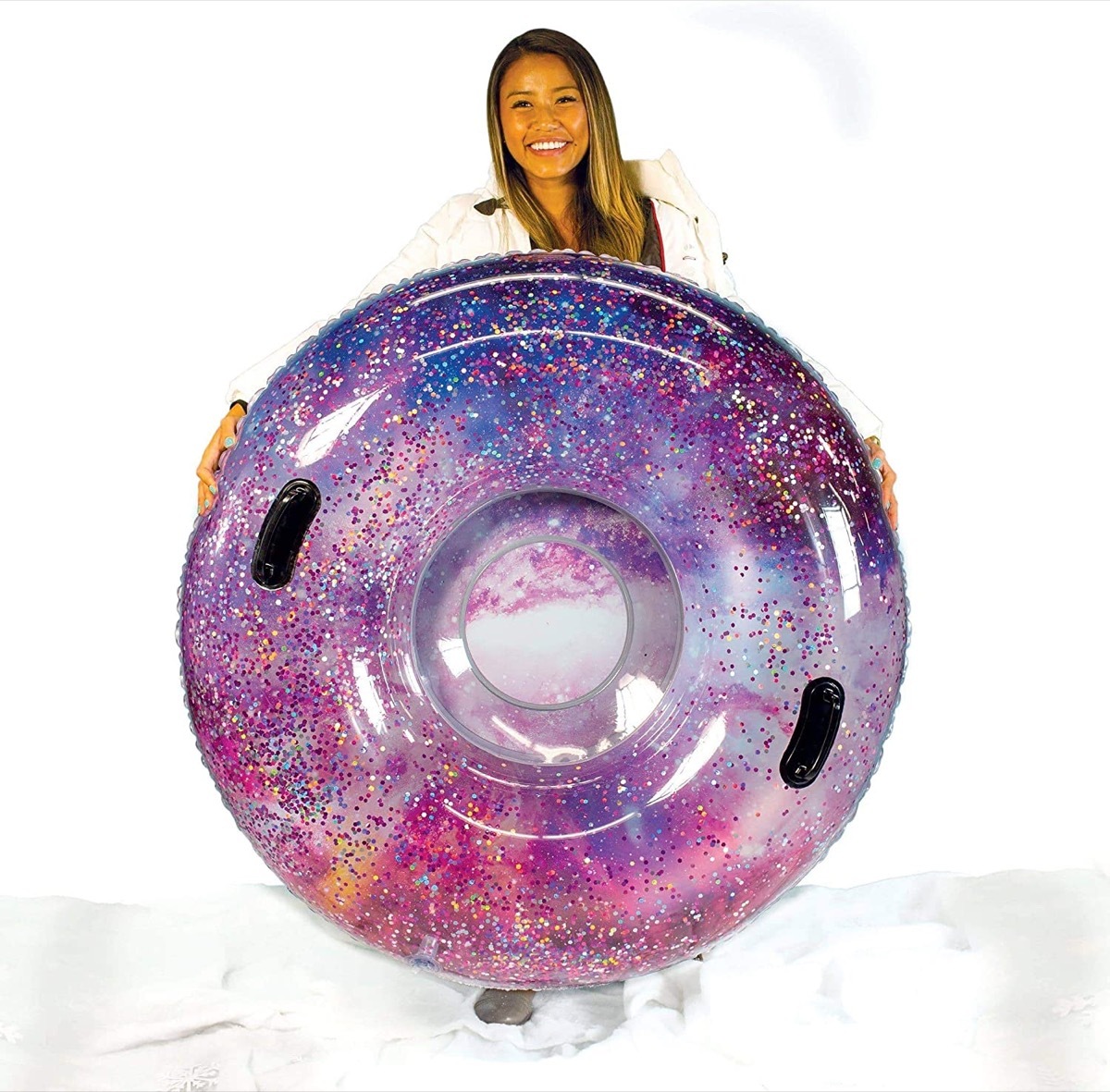 woman holding purple glittery inner tube