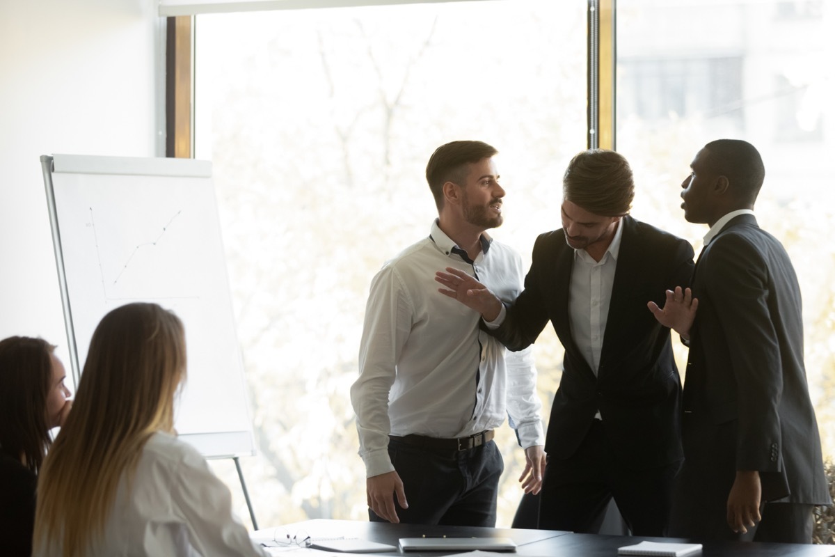 Business Man Mediating Argument