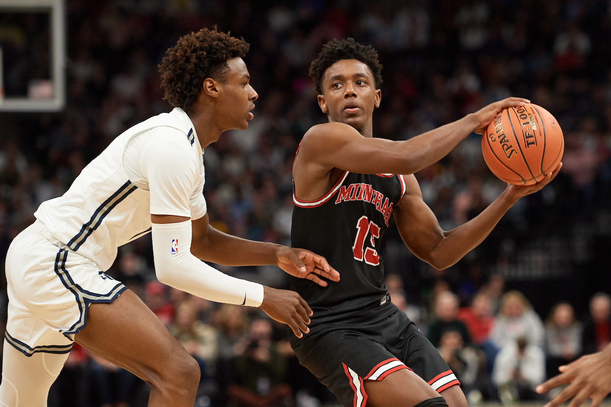 Bronny James #0 of Sierra Canyon Trailblazers defends against Hercy Miller #15 of Minnehaha Academy Red Hawks during the game at Target Center on January 04, 2020 in Minneapolis, Minnesota.