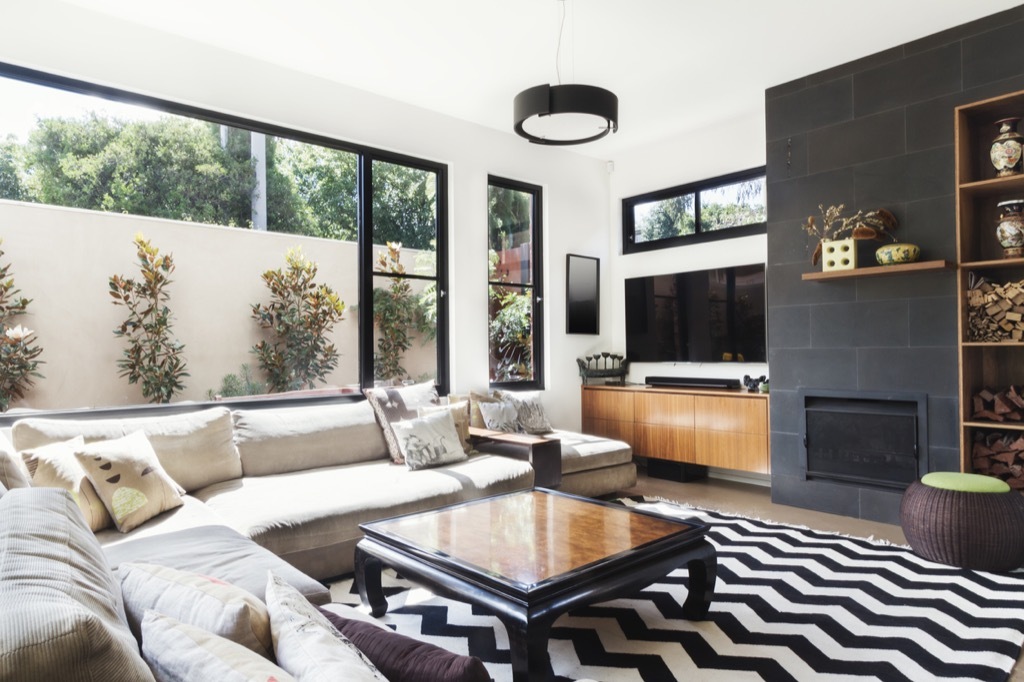 living room with chevron rug, home upgrades